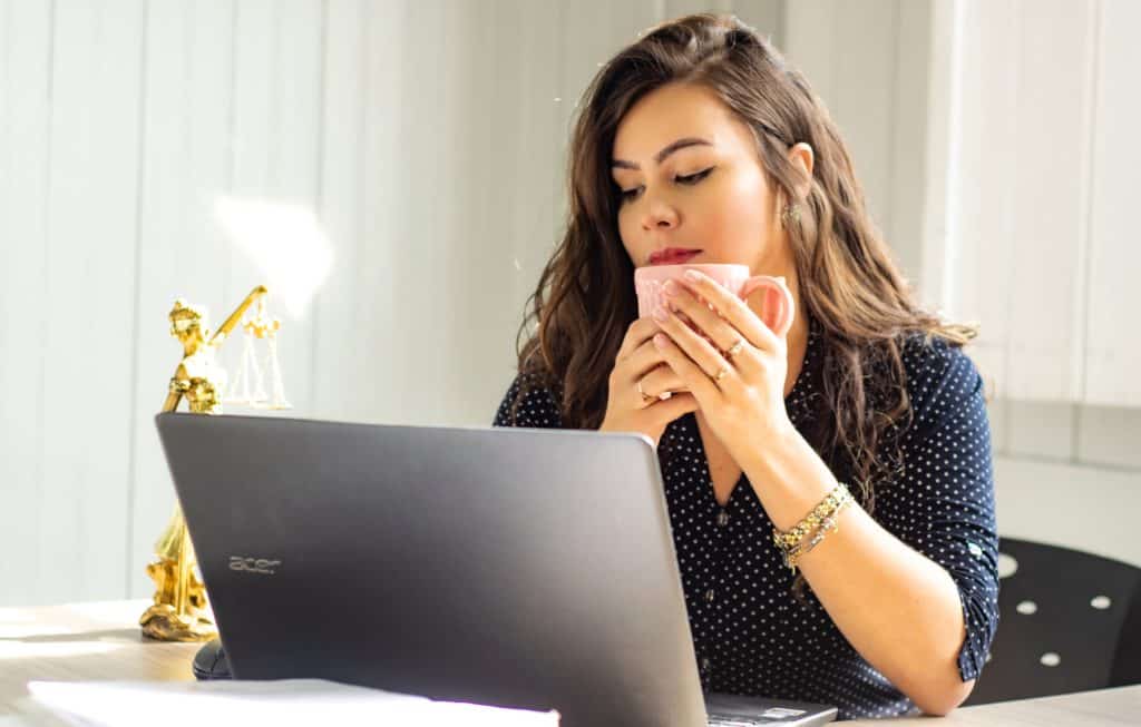 woman reading about preparing to donate eggs